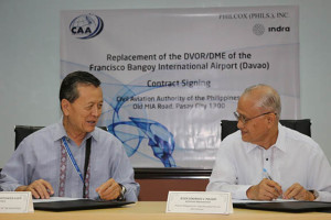 Civil Aviation Authority of the Philippines chief Lt Gen (ret) William Hotchkiss III (left) with Brigadier General (ret) Generoso Maligat, Indra Philippines representative, at the awarding of the  air traffic management system to install a new navigational system at the Francisco Bangoy International Airport (Davao International Airport). Photo courtesy of CAAP.