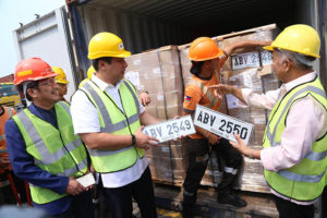 At the turnover of abandoned license plates were, left to right, Customs Revenue and Collection Monitoring Group deputy commissioner Arturo Lachica, Land Transportation Office chief Roberto Cabrera, and Customs Commissioner Alberto Lina.