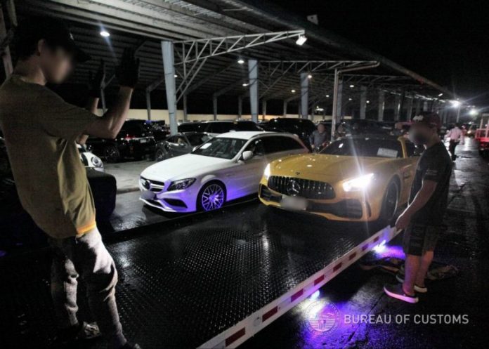 BOC seizes 51 luxury cars in Pasig showroom